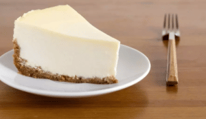 What makes a cheesecake dense or fluffy